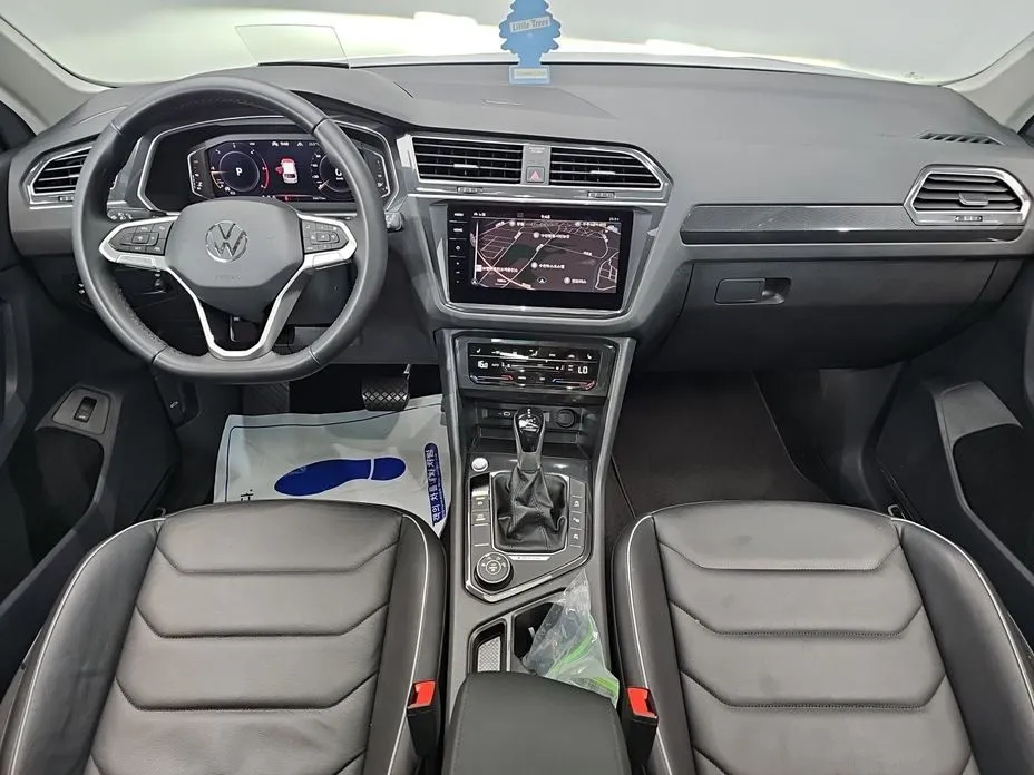 Volkswagen Tiguan — фото 8