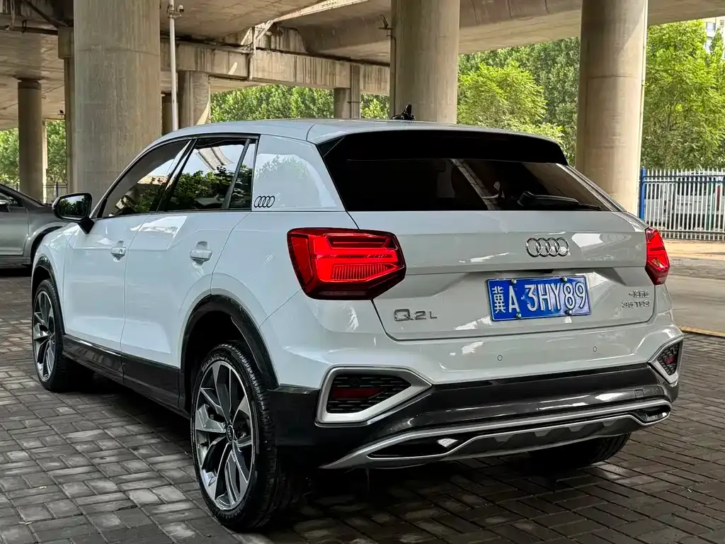 Audi Q2L — фото 7