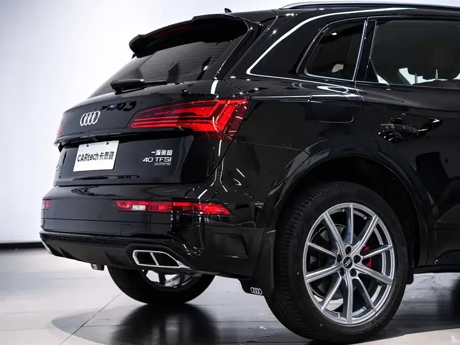 Audi Q5L — фото 9