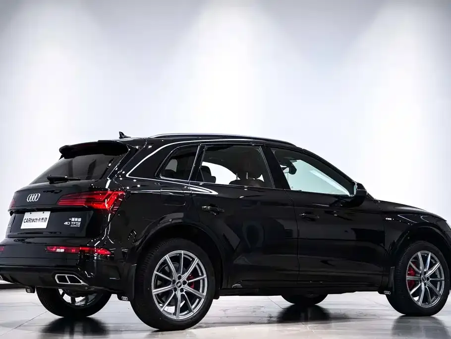 Audi Q5L — фото 5