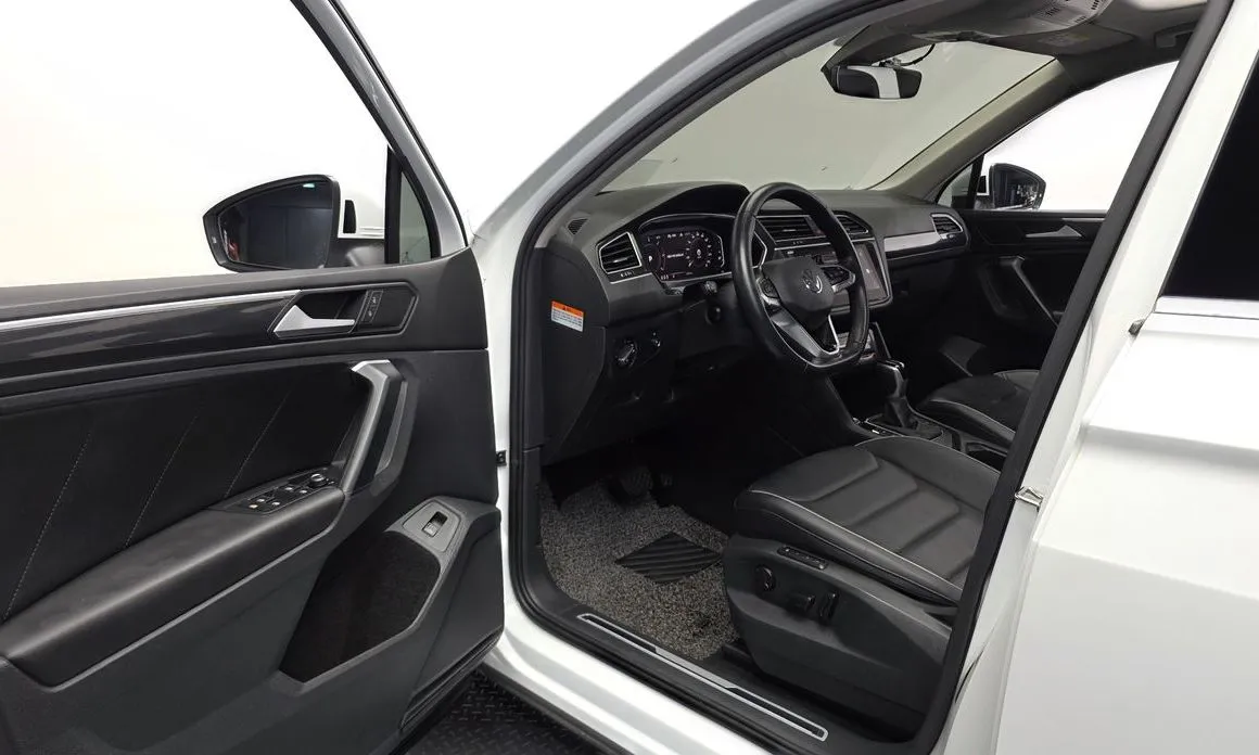 Volkswagen Tiguan — фото 5