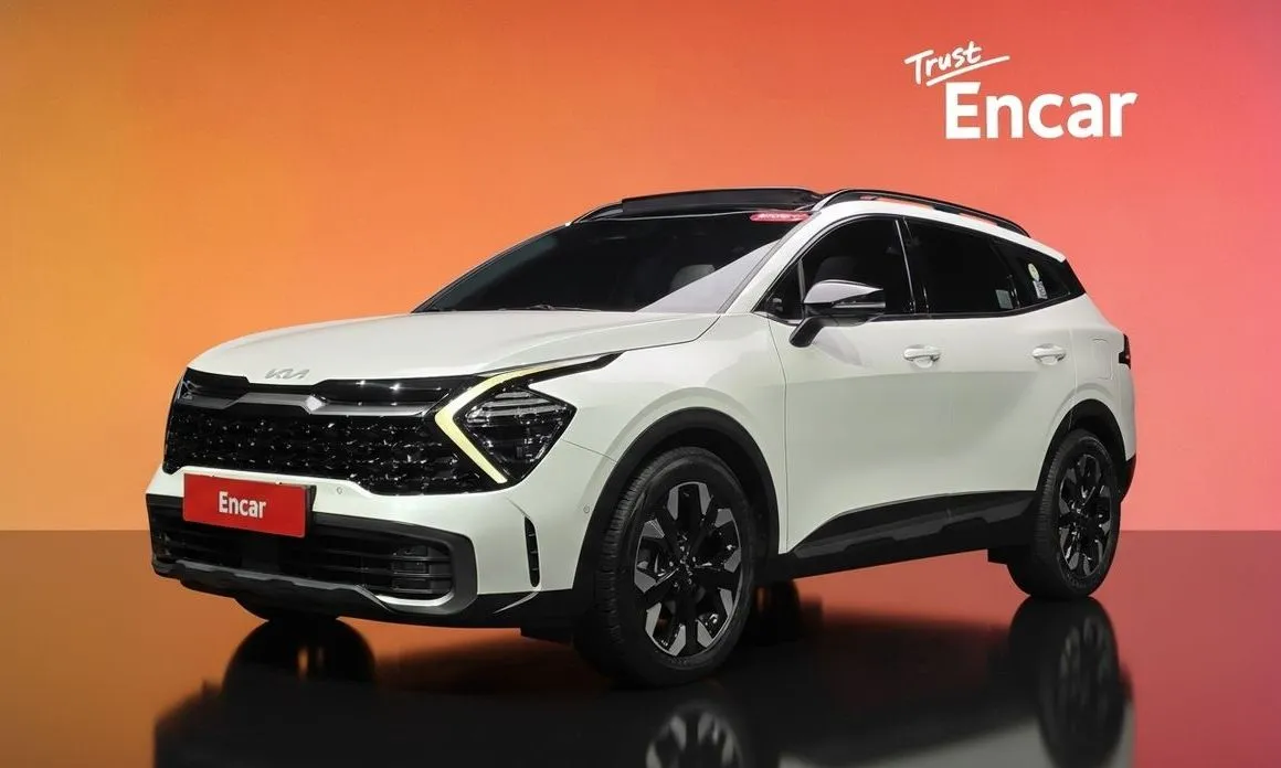 Kia Sportage — фото 1