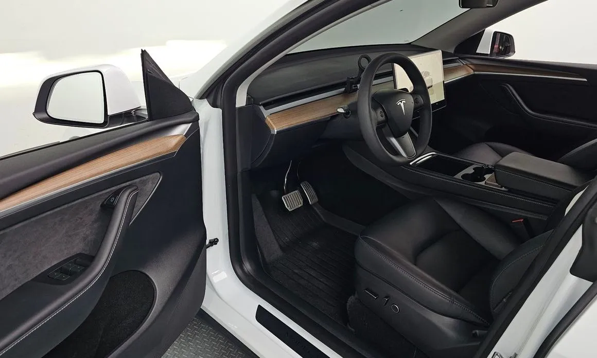 Tesla Model Y — фото 7