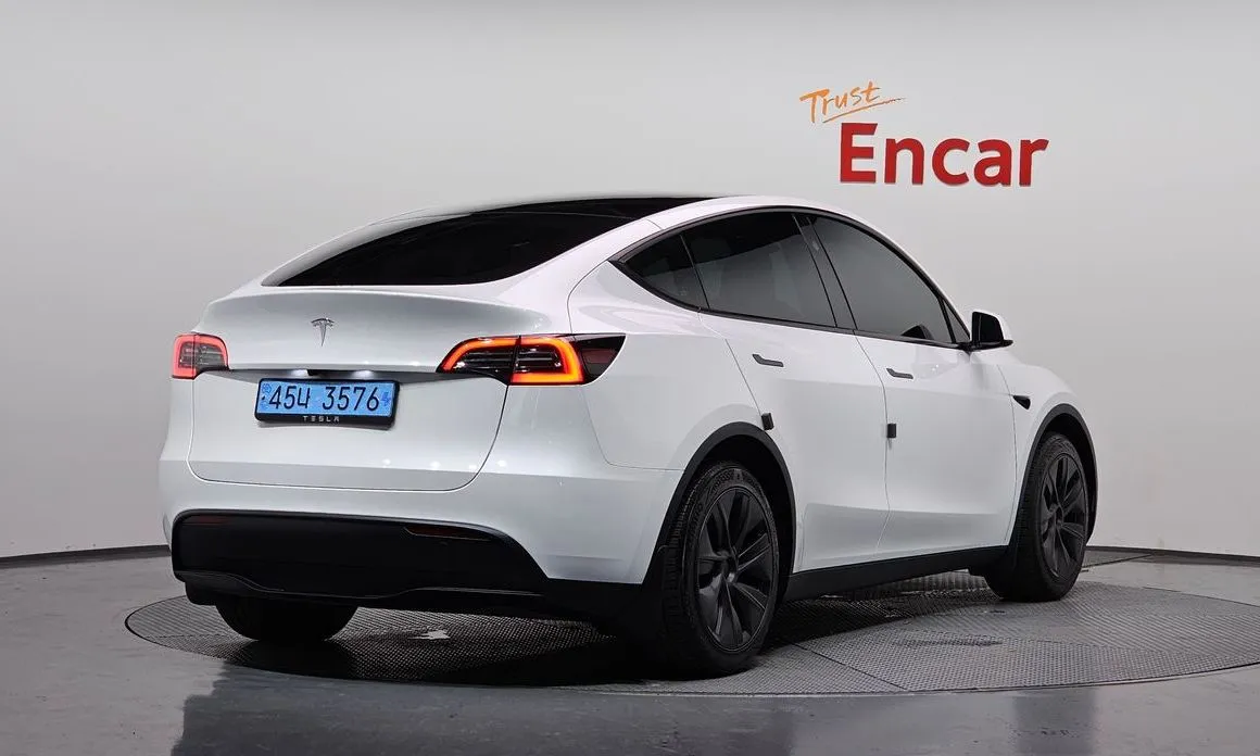 Tesla Model Y — фото 9