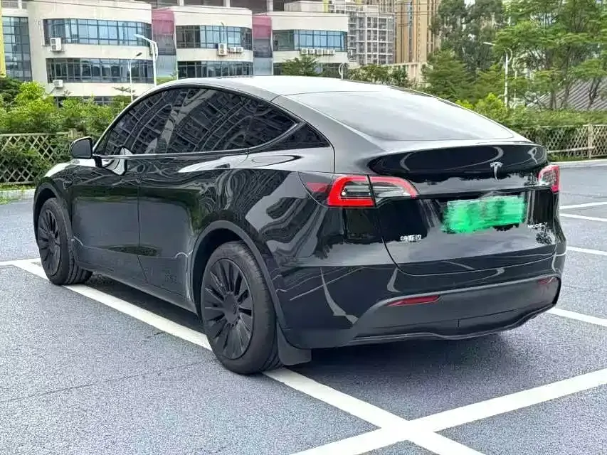Tesla Model Y — фото 7