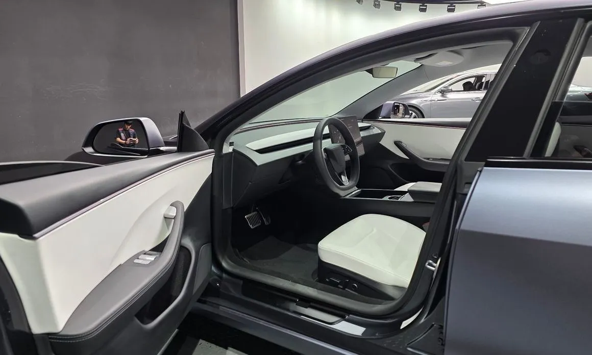 Tesla Model 3 — фото 7