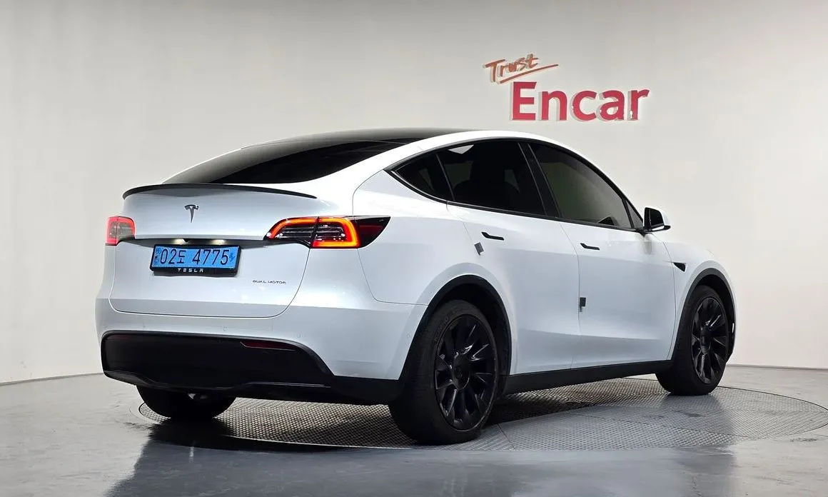 Tesla Model Y — фото 5