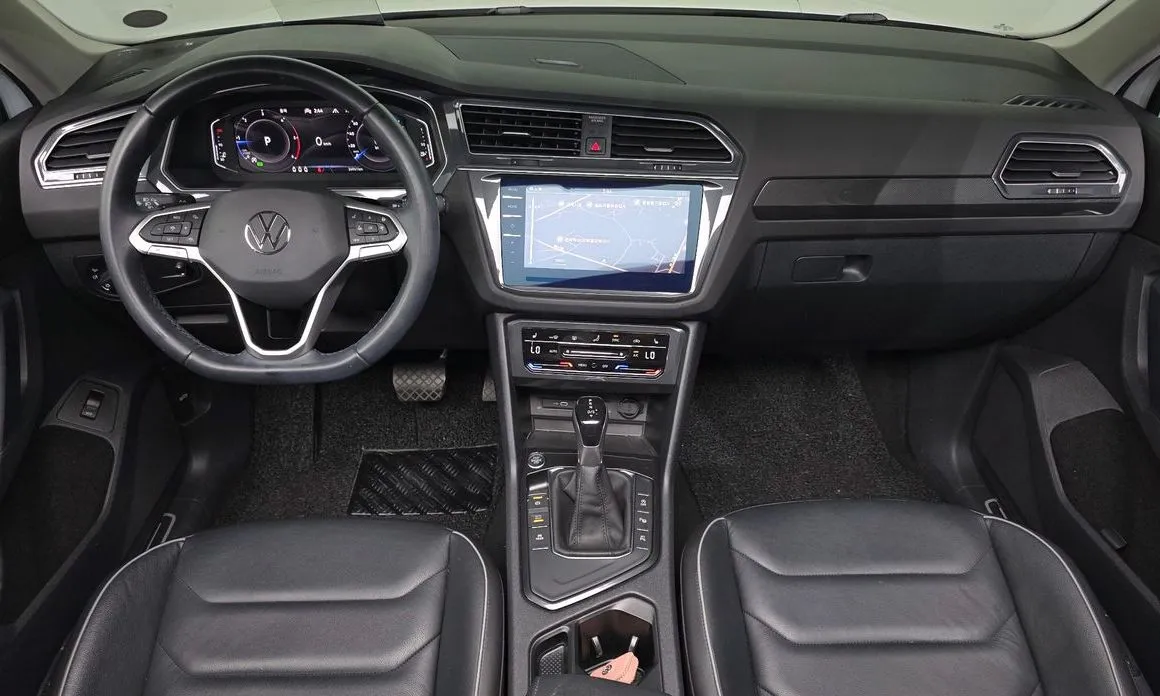 Volkswagen Tiguan — фото 10