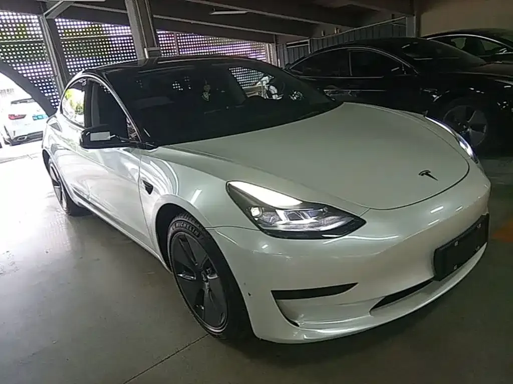 Tesla Model 3 — фото 7
