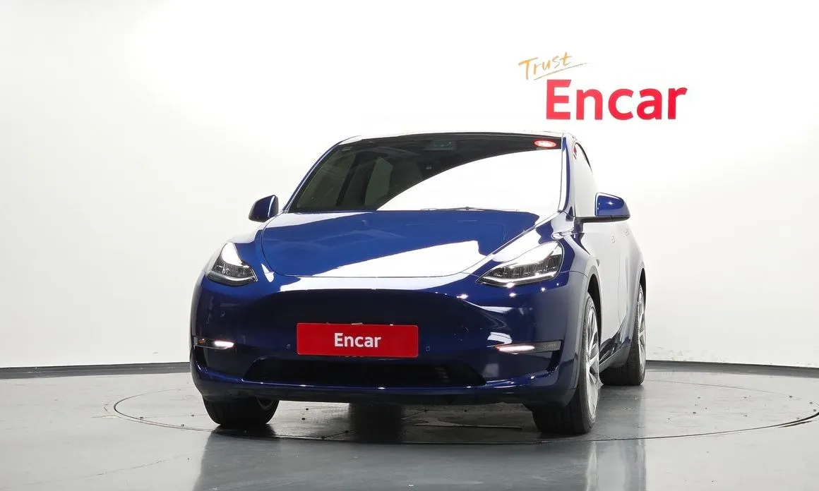 Tesla Model Y — фото 7