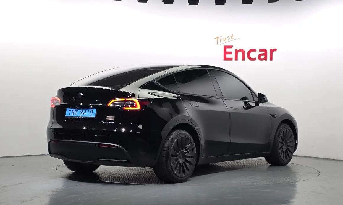 Tesla Model Y — фото 8