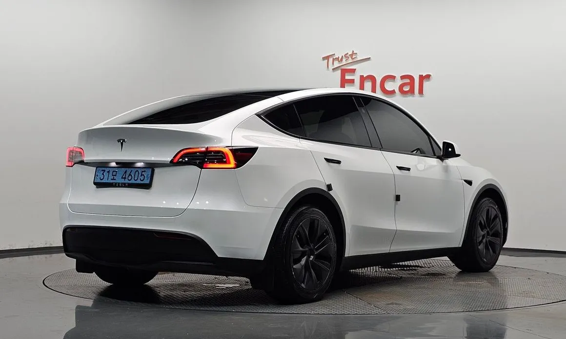 Tesla Model Y — фото 7