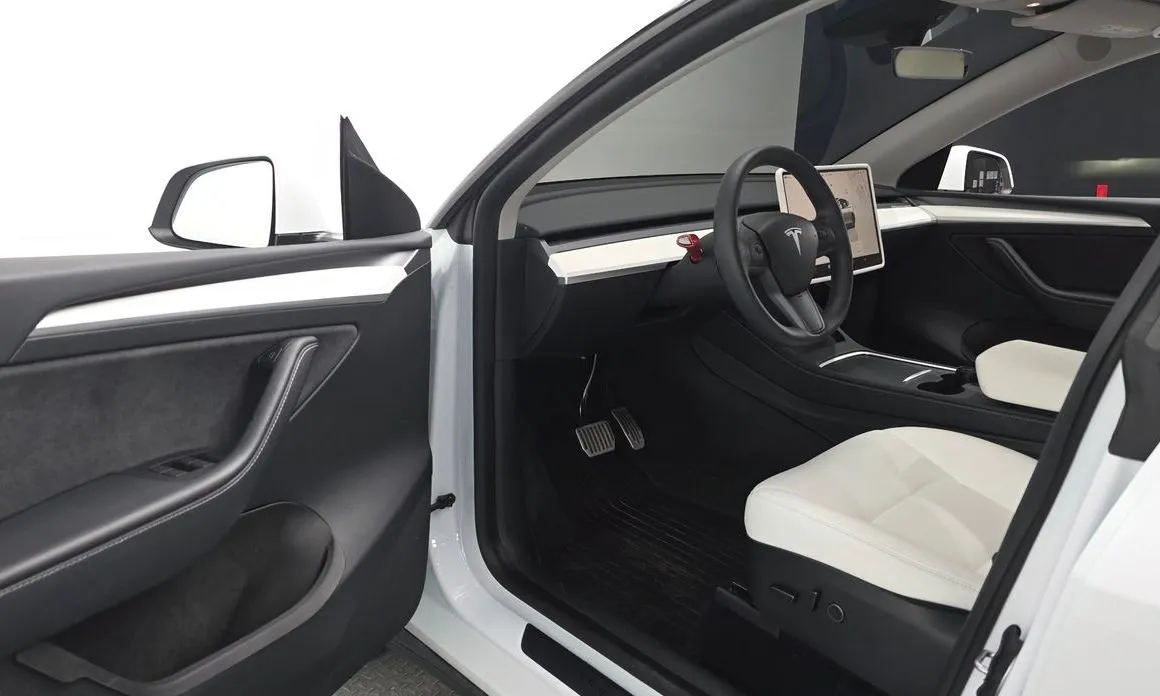 Tesla Model Y — фото 7