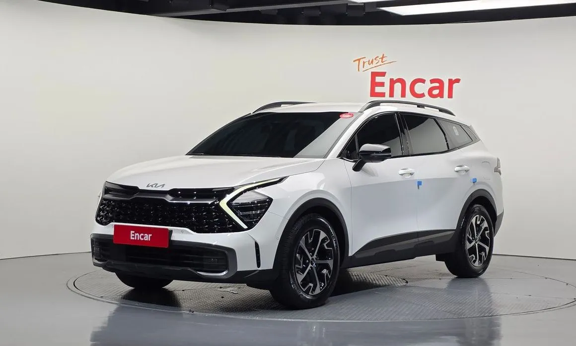 Kia Sportage — фото 1