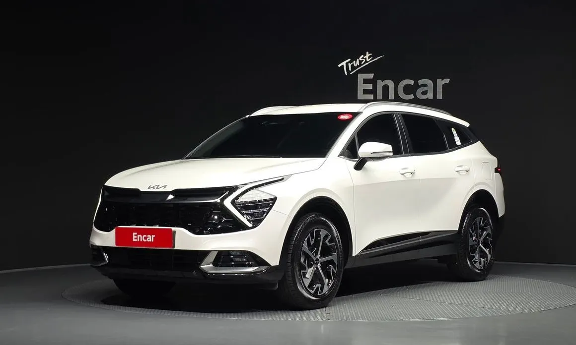 Kia Sportage — фото 1