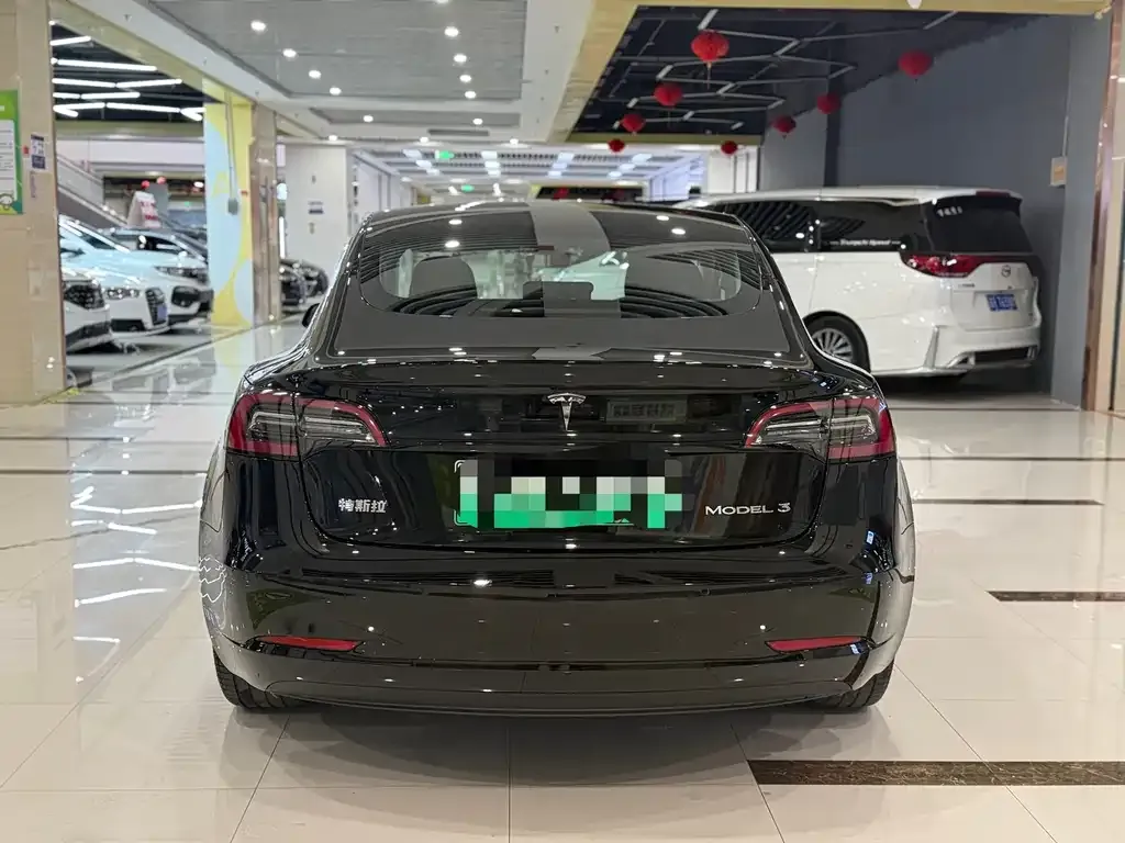 Tesla Model 3 — фото 5