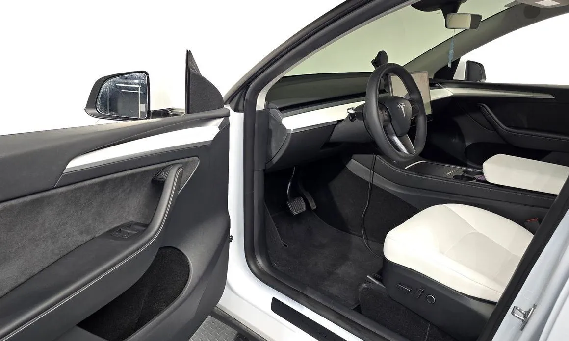 Tesla Model Y — фото 6