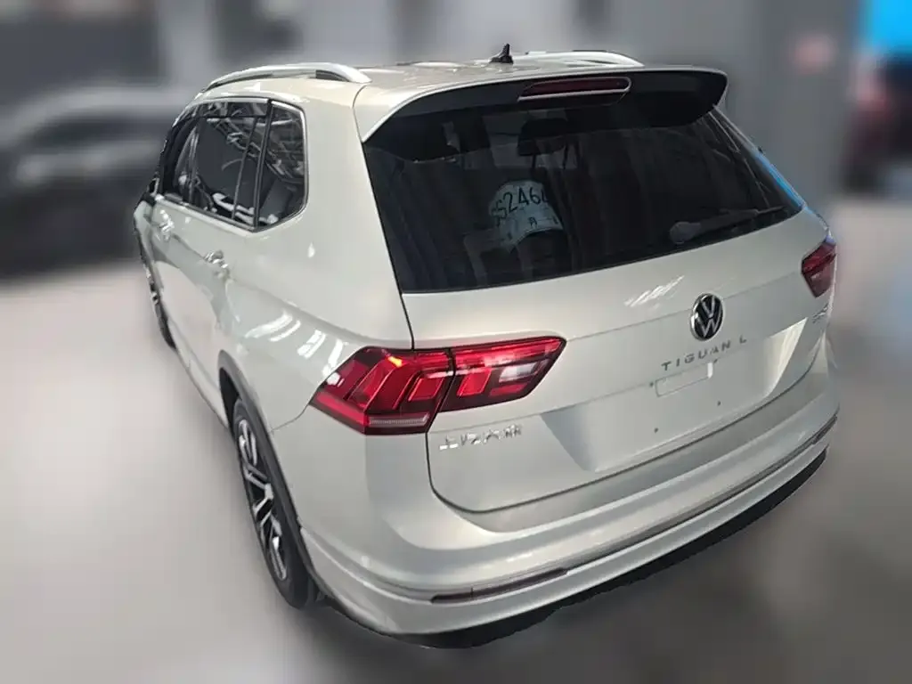 Volkswagen Tiguan L — фото 7
