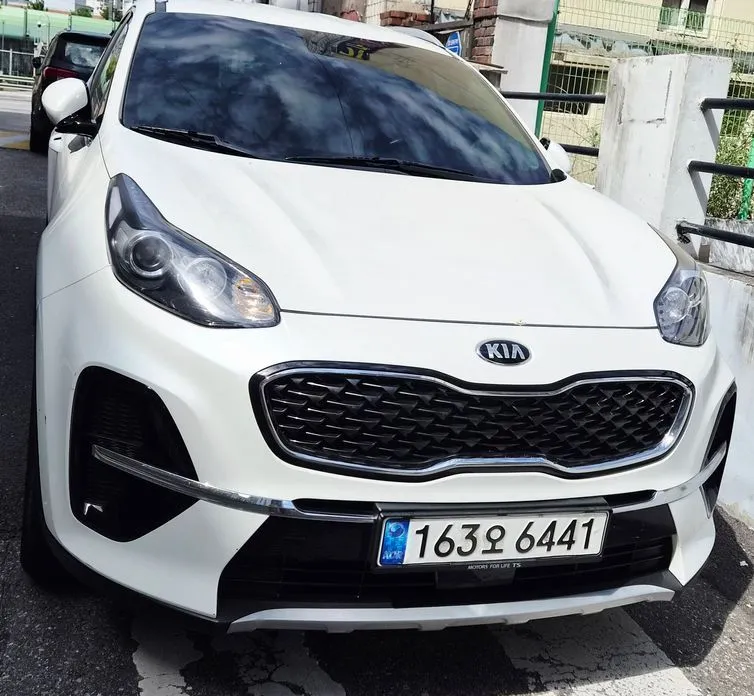 Kia Sportage — фото 1