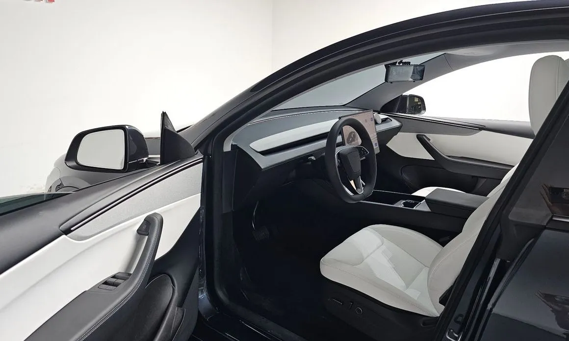 Tesla Model Y — фото 5