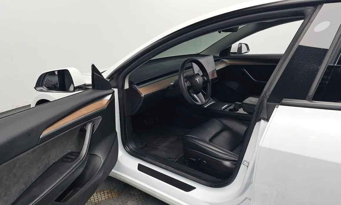 Tesla Model 3 — фото 6