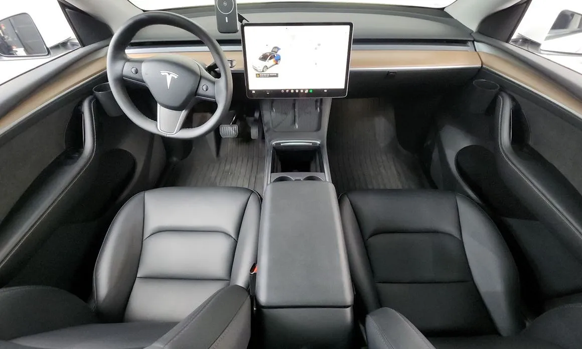 Tesla Model Y — фото 7