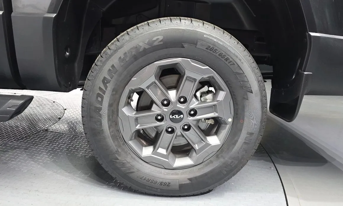Kia Tasman — фото 10