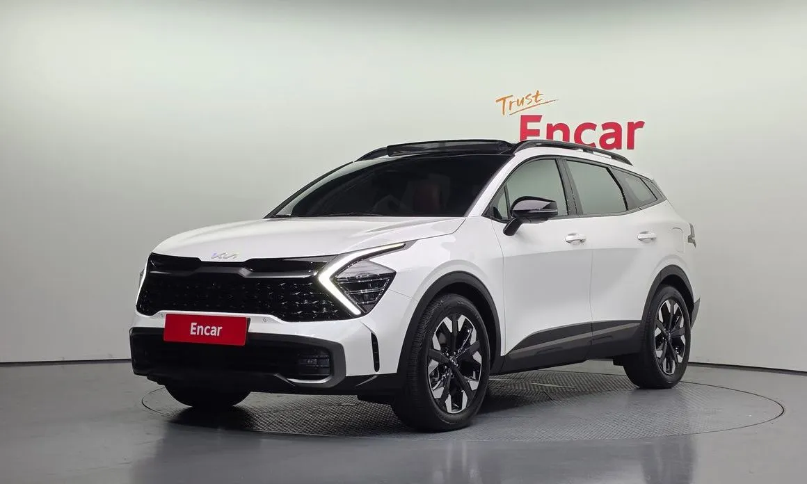 Kia Sportage — фото 1