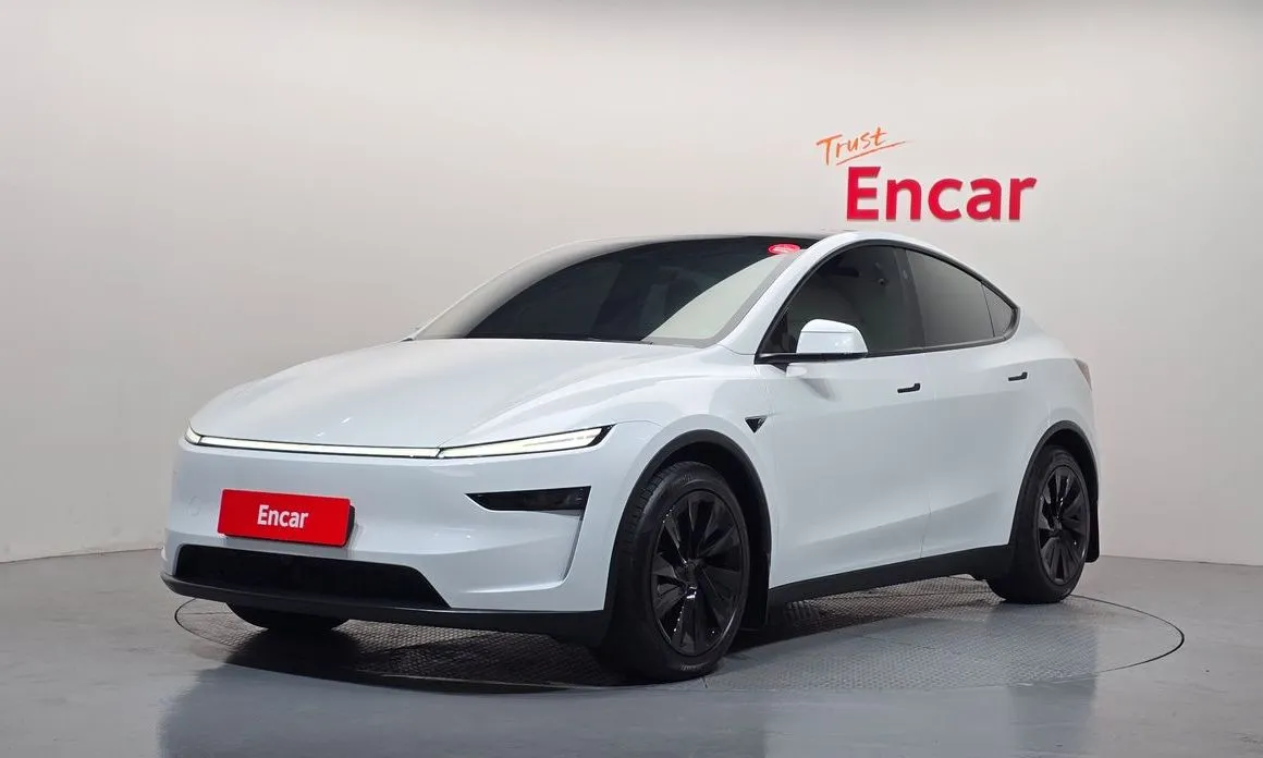 Tesla Model Y — фото 1