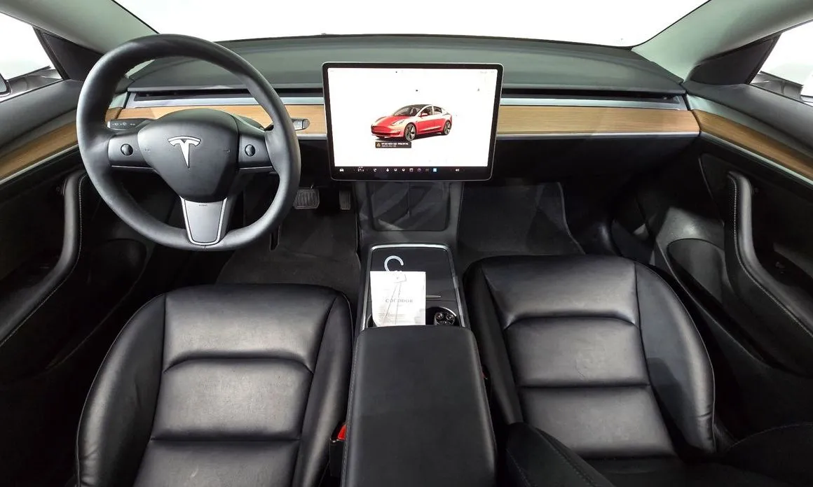 Tesla Model 3 — фото 6