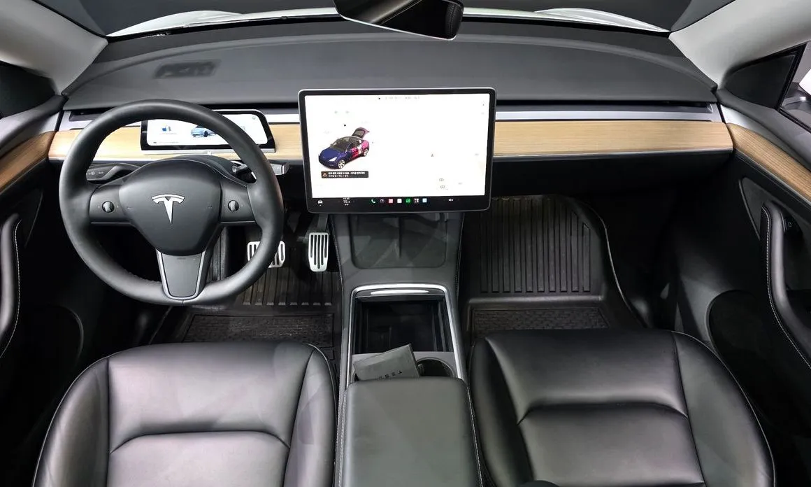 Tesla Model Y — фото 7