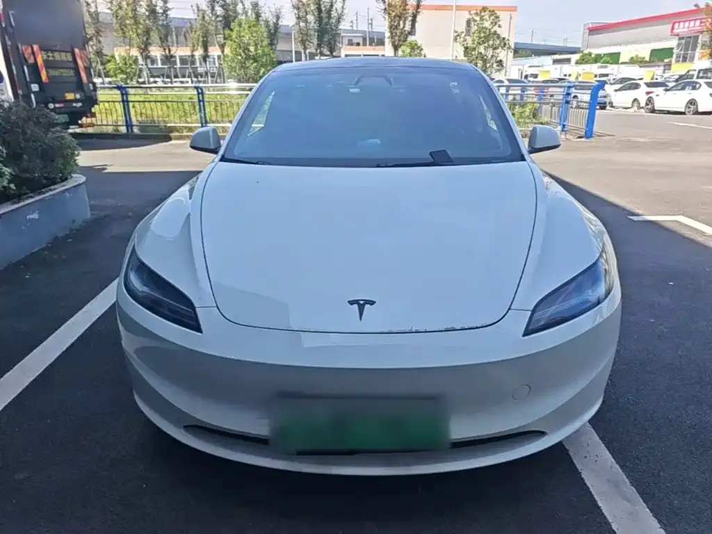 Tesla Model 3 — фото 7