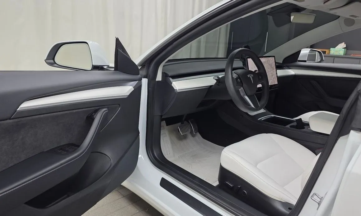 Tesla Model 3 — фото 10
