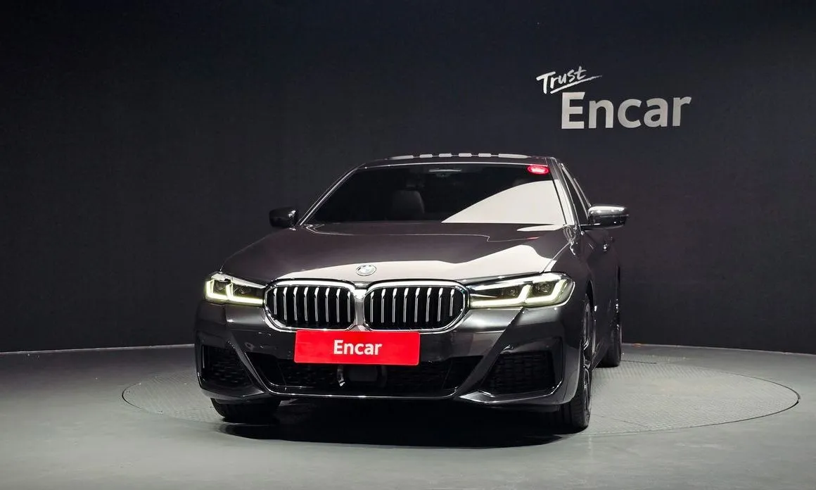 BMW 5-Series — фото 10
