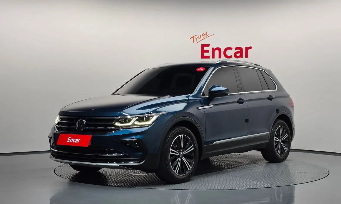 Volkswagen Tiguan — фото 1