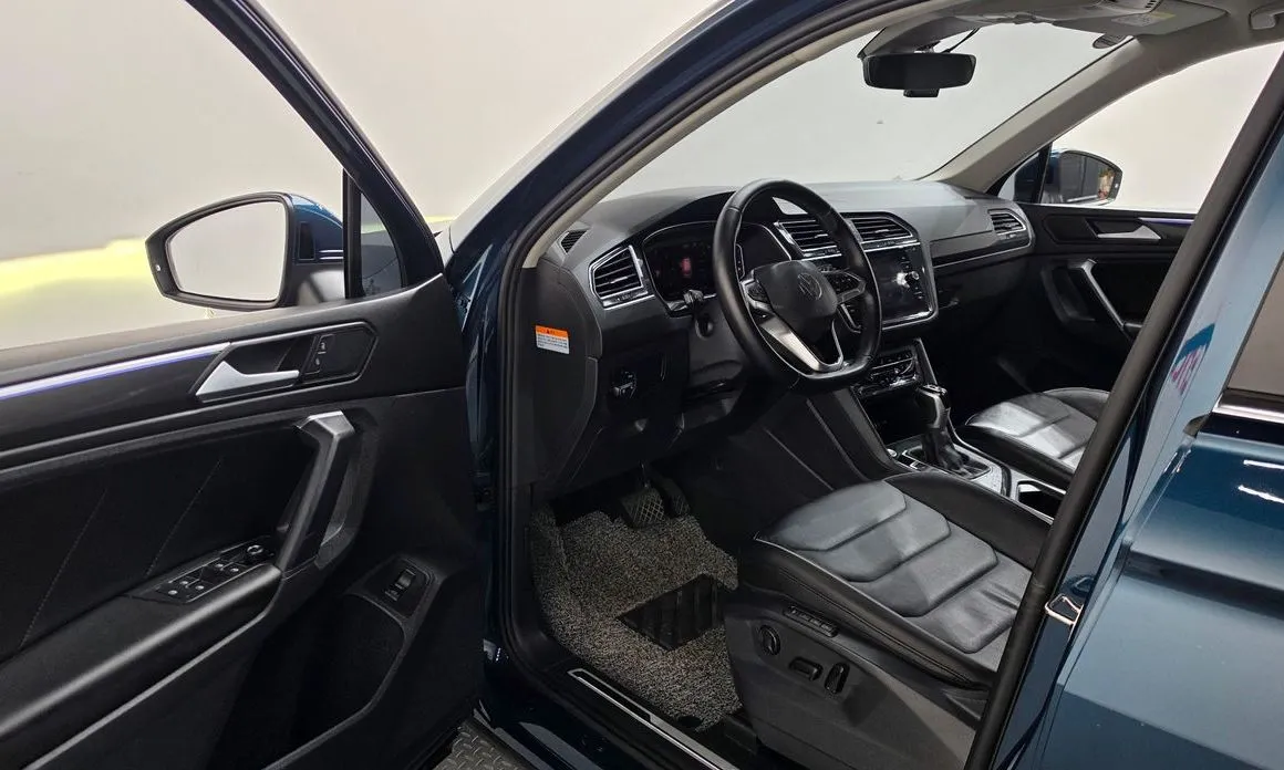 Volkswagen Tiguan — фото 10