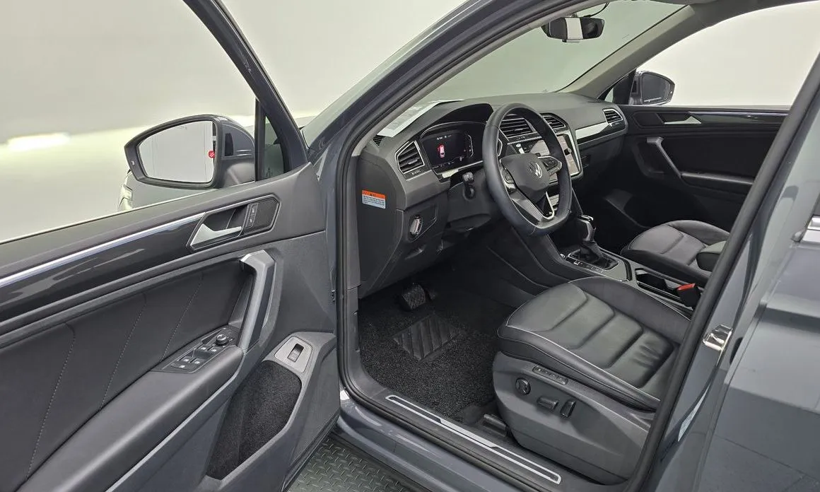 Volkswagen Tiguan — фото 7