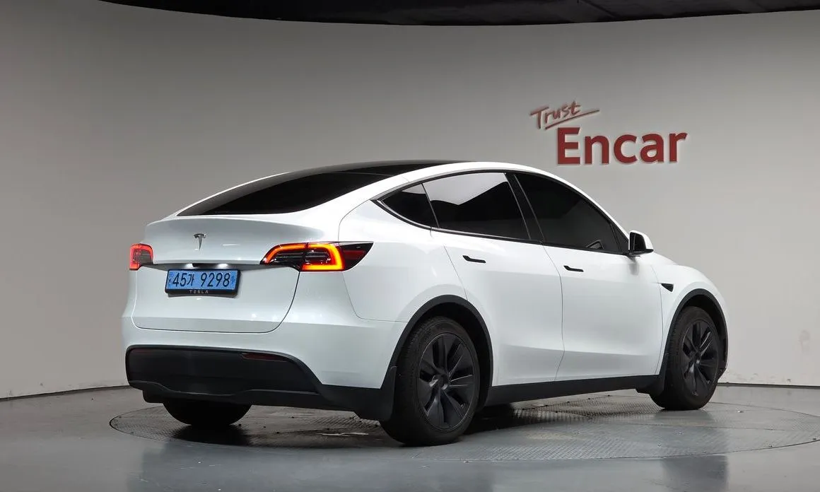 Tesla Model Y — фото 6