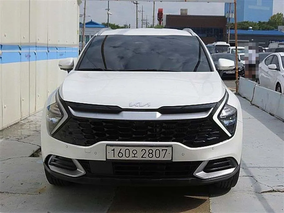 Kia Sportage — фото 1