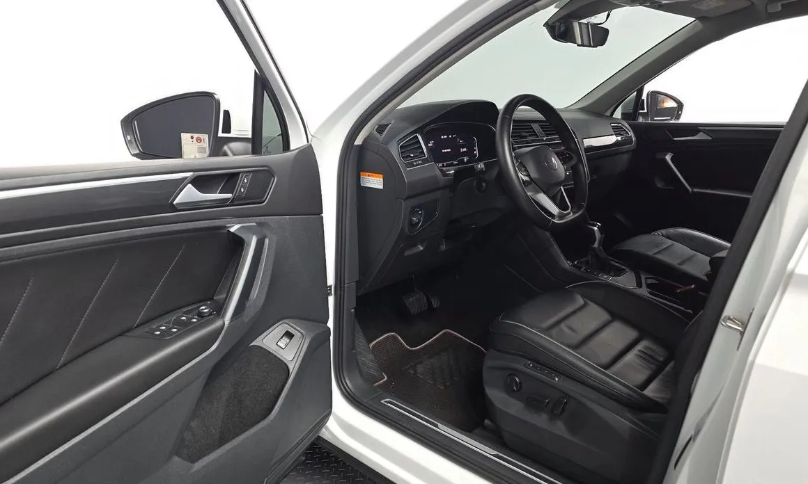 Volkswagen Tiguan — фото 8