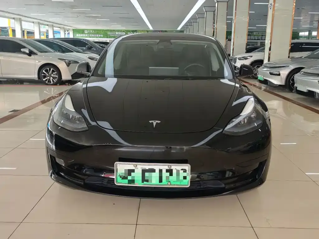Tesla Model 3 — фото 9