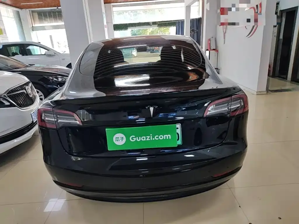 Tesla Model 3 — фото 5