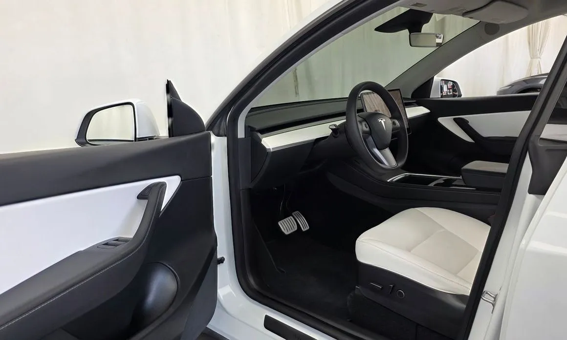 Tesla Model Y — фото 8