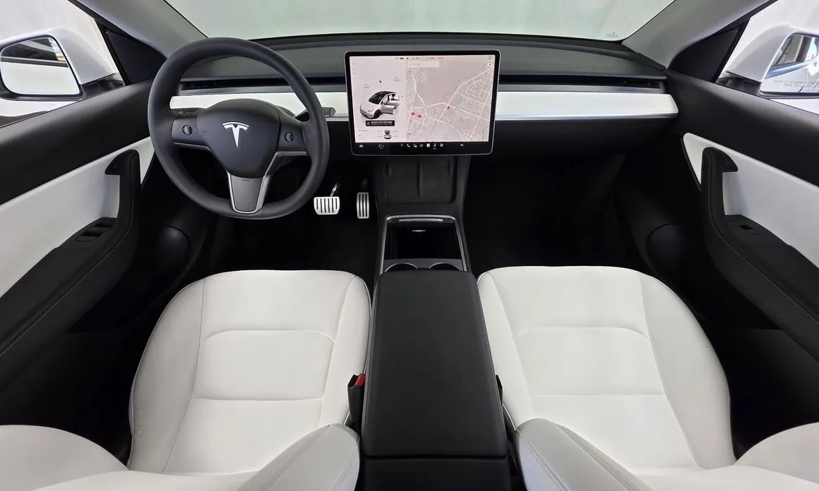 Tesla Model Y — фото 7