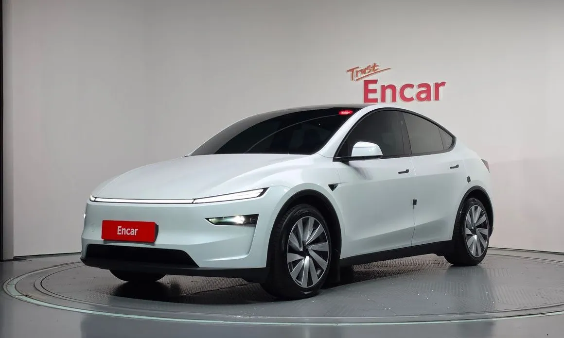 Tesla Model Y — фото 1
