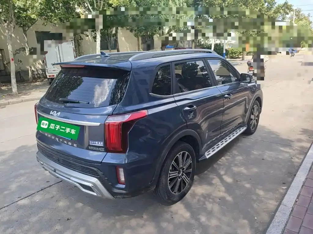 Kia Sportage — фото 10