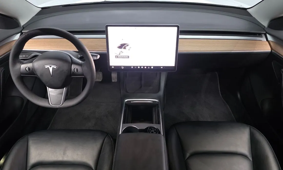 Tesla Model 3 — фото 10