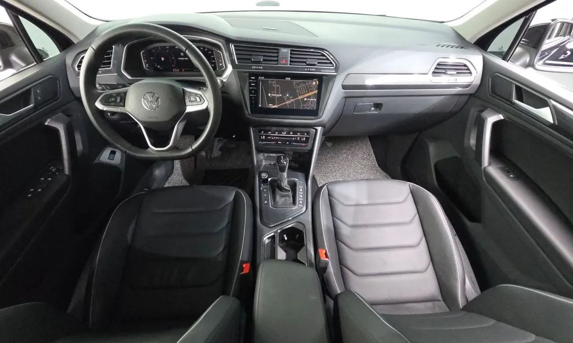 Volkswagen Tiguan — фото 8