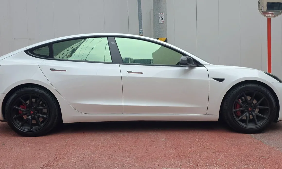 Tesla Model 3 — фото 10