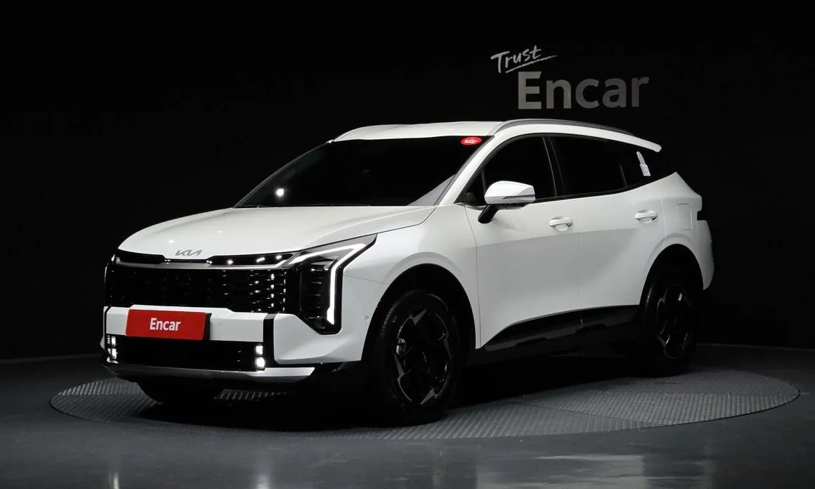 Kia Sportage — фото 1